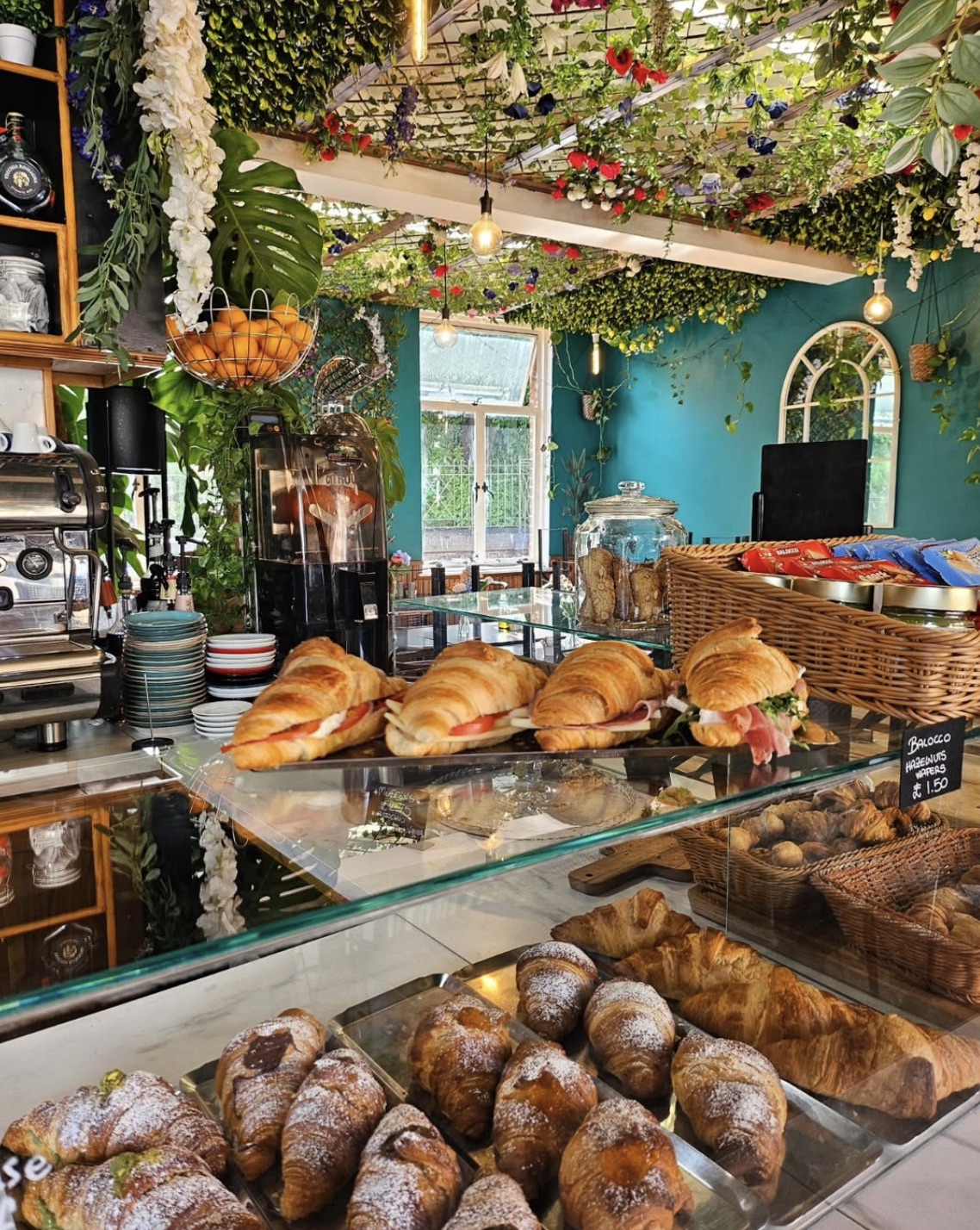 The flower-covered interior of Zuki's Caffetteria